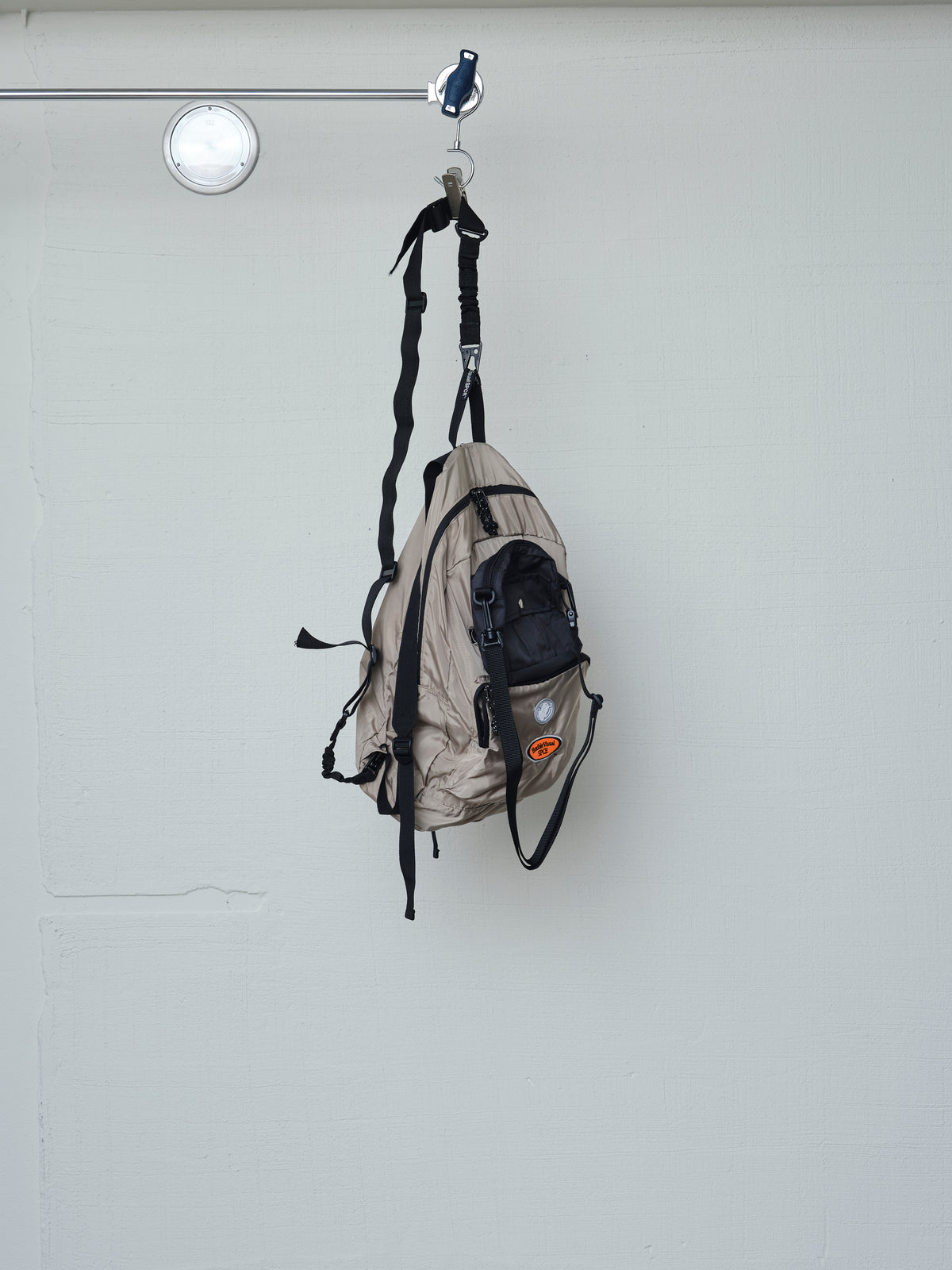 POUCH DOCKED EMBROIDERED SLING BAG