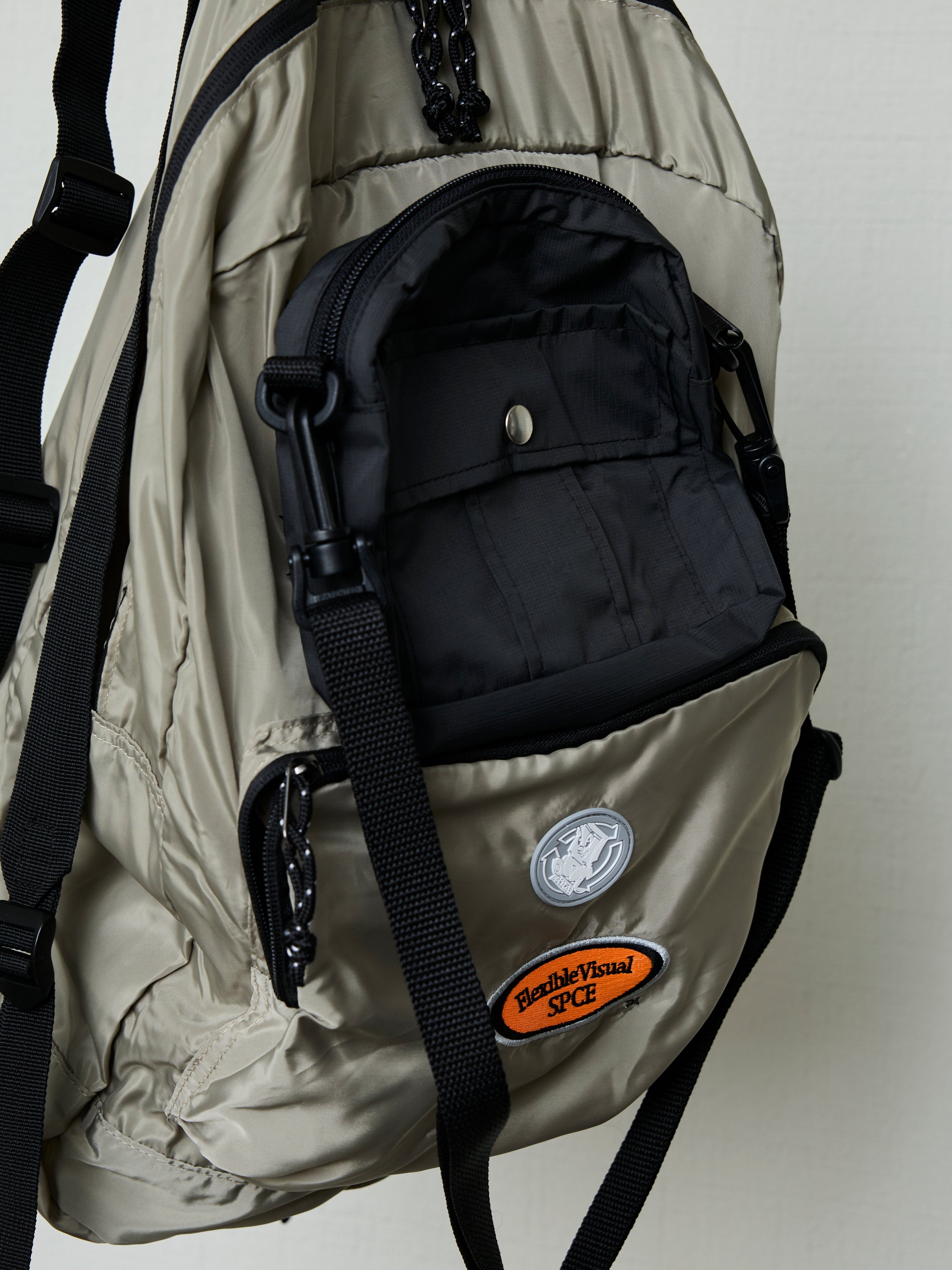 POUCH DOCKED EMBROIDERED SLING BAG